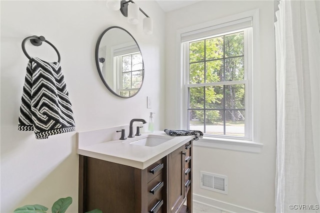 6405 Hagueman Dr, Richmond, VA 23225 - full bath with plenty of natural light, vanity, and baseboards
