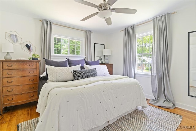 6405 Hagueman Dr, Richmond, VA 23225 - bedroom featuring wood finished floors, baseboards, and ceiling fan