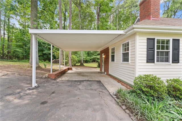 6405 Hagueman Dr, Richmond, VA 23225 - view of patio / terrace featuring driveway and a carport