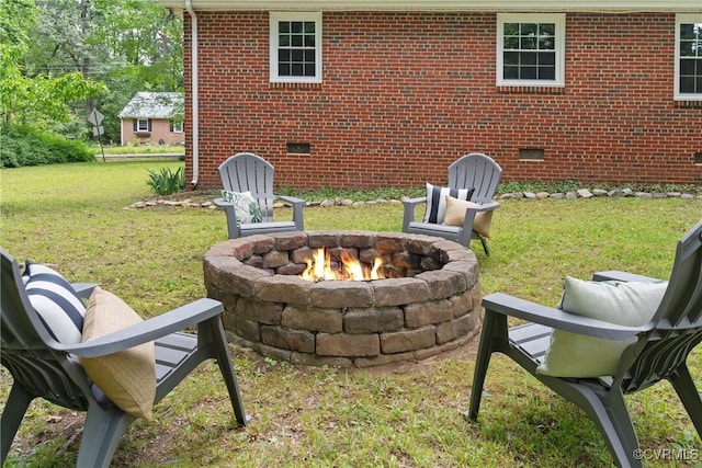 6405 Hagueman Dr, Richmond, VA 23225 - view of green lawn with an outdoor fire pit