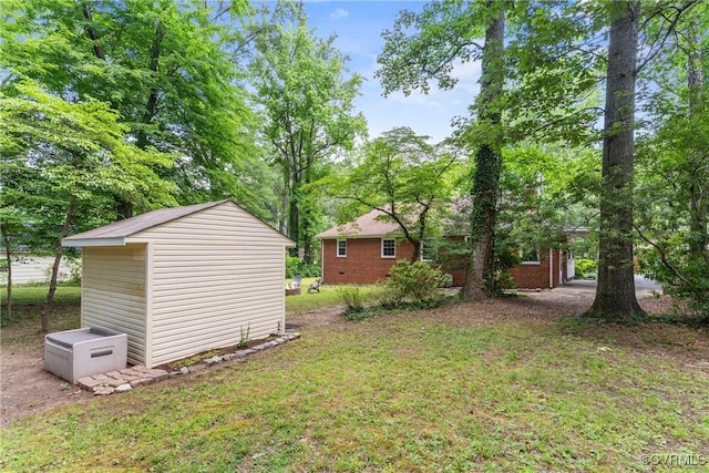 6405 Hagueman Dr, Richmond, VA 23225 - view of grassy yard featuring an outbuilding