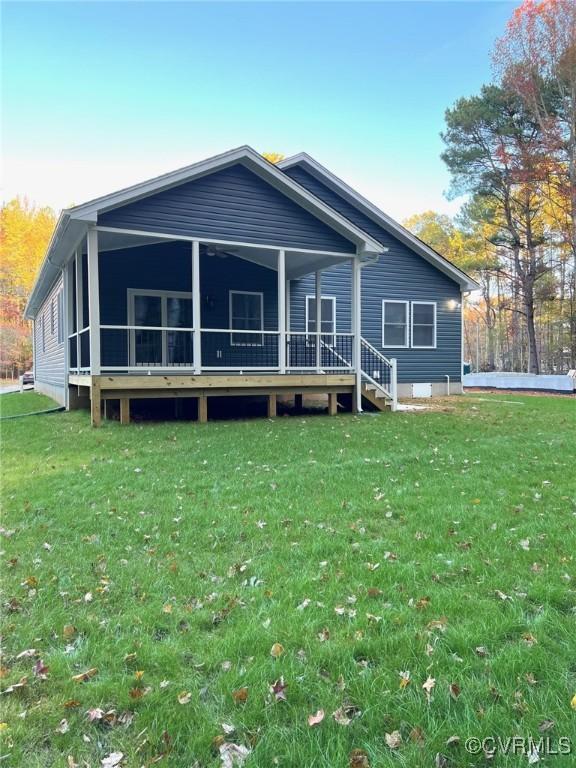 94 Dingley Rd, Montross, VA 22520 - back of house with a lawn