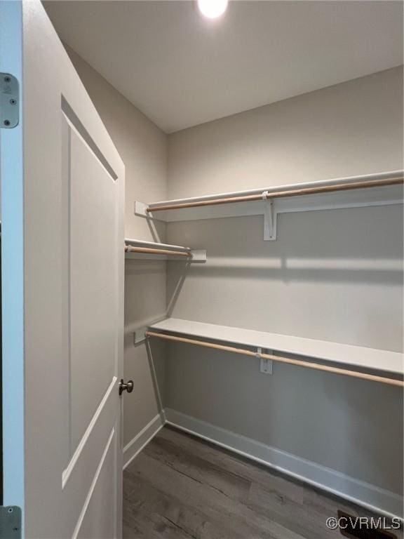 94 Dingley Rd, Montross, VA 22520 - spacious closet featuring dark wood-style flooring