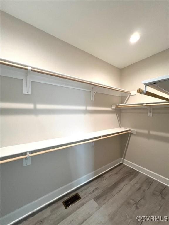94 Dingley Rd, Montross, VA 22520 - spacious closet with dark wood finished floors