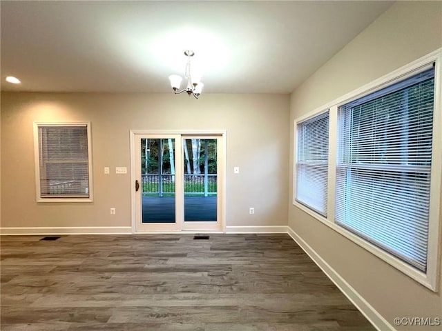 94 Dingley Rd, Montross, VA 22520 - unfurnished dining area featuring a chandelier, dark wood finished floors, baseboards, and recessed lighting