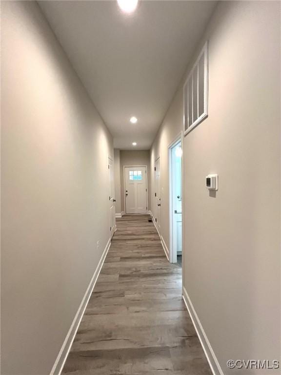 94 Dingley Rd, Montross, VA 22520 - corridor with dark wood-type flooring, baseboards, and recessed lighting
