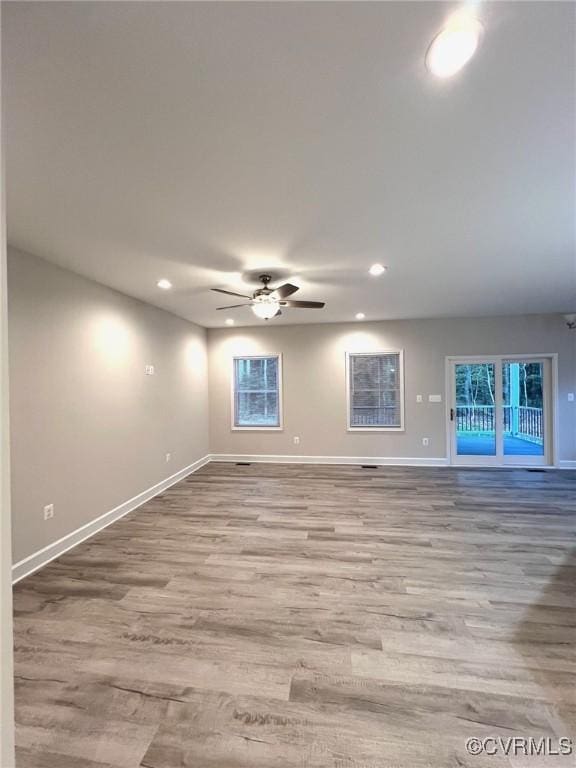 94 Dingley Rd, Montross, VA 22520 - empty room with a ceiling fan, baseboards, wood finished floors, and recessed lighting