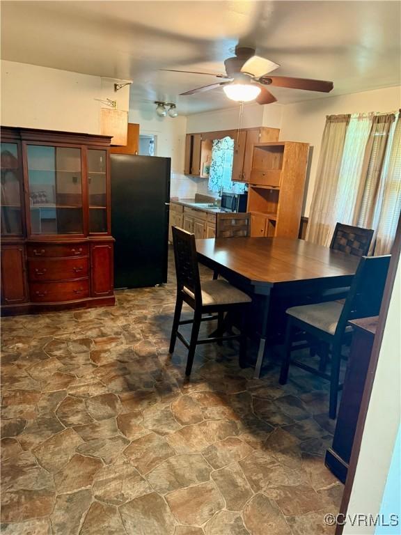 1501 Campbell Dr, Petersburg, VA 23803 - dining room with dark stone finish flooring and ceiling fan