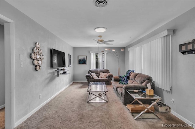 7486 Roaring Springs Rd, Gloucester, VA 23062 - living area featuring ceiling fan, baseboards, and carpet floors