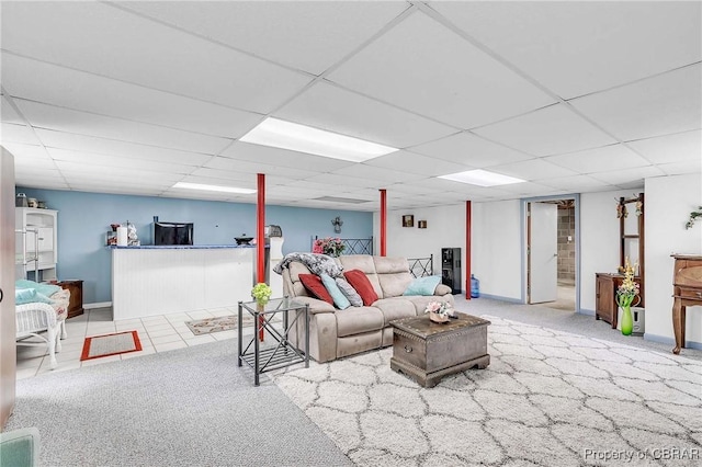 7486 Roaring Springs Rd, Gloucester, VA 23062 - living room with carpet floors, baseboards, and a paneled ceiling