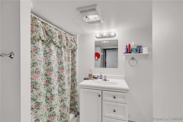 7486 Roaring Springs Rd, Gloucester, VA 23062 - bathroom featuring vanity and a shower with curtain