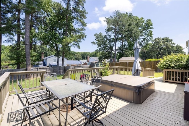 406 Windmere Dr, Colonial Heights, VA 23834 - deck with outdoor dining area, a covered hot tub, a fenced backyard, and a storage unit