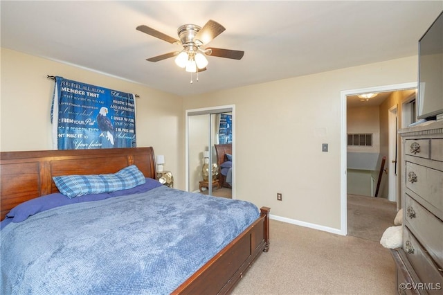 406 Windmere Dr, Colonial Heights, VA 23834 - bedroom featuring light colored carpet, a closet, and a ceiling fan