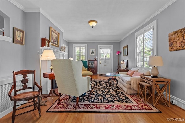 1520 Bellevue Ave, Richmond, VA 23227 - living area with wood-type flooring, crown molding, and a fireplace