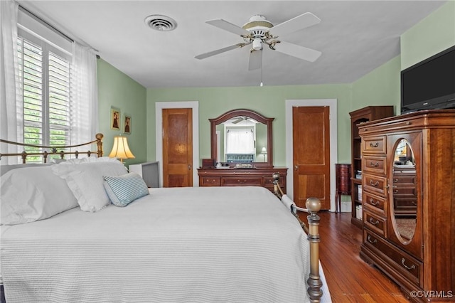 1520 Bellevue Ave, Richmond, VA 23227 - bedroom featuring dark wood-style flooring and ceiling fan