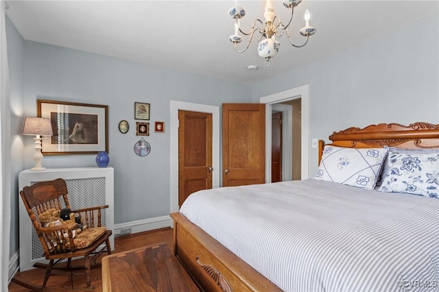 1520 Bellevue Ave, Richmond, VA 23227 - bedroom with a chandelier and wood finished floors