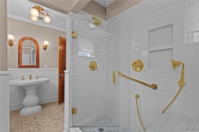 1520 Bellevue Ave, Richmond, VA 23227 - bathroom featuring a stall shower, wainscoting, and crown molding