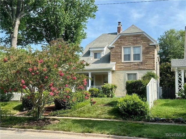 1520 Bellevue Ave, Richmond, VA 23227 - view of front of property with covered porch, a chimney, stucco siding, and stone siding