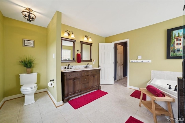 8390 Bink Pl, Mechanicsville, VA 23111 - bathroom featuring double vanity, a garden tub, baseboards, and tile patterned flooring
