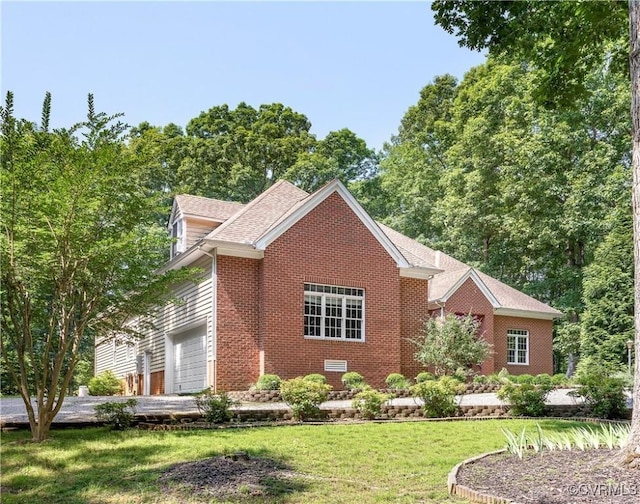 2017 Valley Springs Ct, Powhatan, VA 23139 - view of front of home featuring a garage, a front lawn, and brick siding
