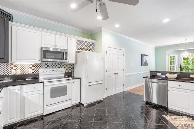 2017 Valley Springs Ct, Powhatan, VA 23139 - kitchen with stainless steel appliances, dark countertops, granite tiled floors, white cabinetry, and crown molding