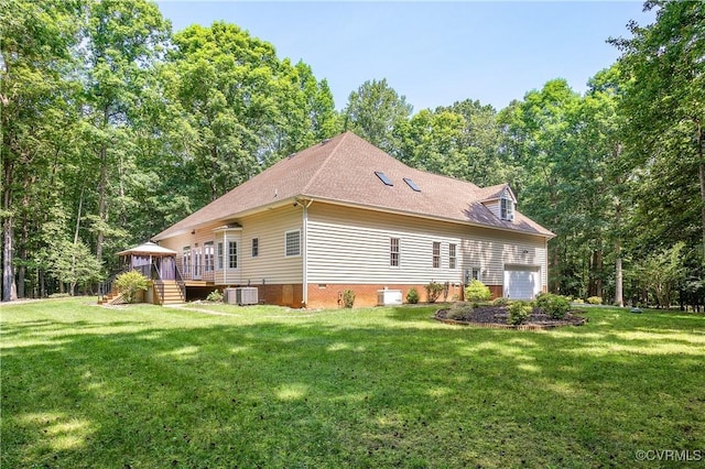 2017 Valley Springs Ct, Powhatan, VA 23139 - rear view of house featuring a garage, a yard, a gazebo, and a wooden deck