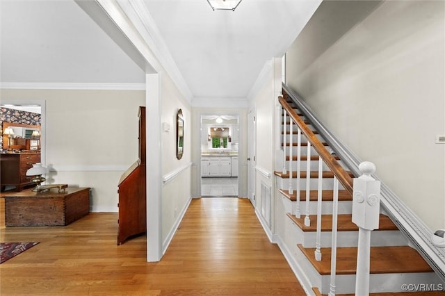 13211 Powderham Ln, Midlothian, VA 23113 - hallway with stairway, ornamental molding, and light wood-type flooring