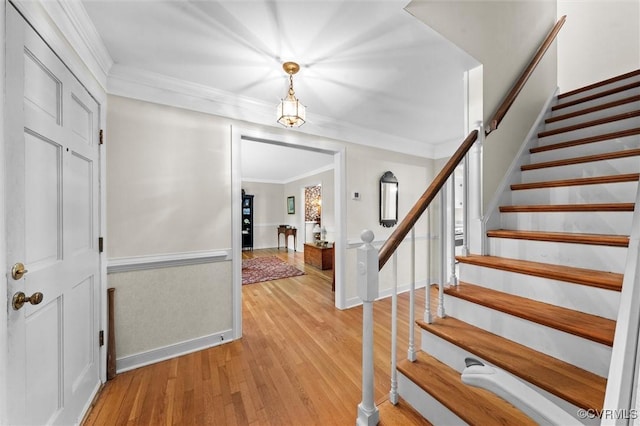 13211 Powderham Ln, Midlothian, VA 23113 - foyer featuring stairs, light wood-style flooring, crown molding, and wainscoting
