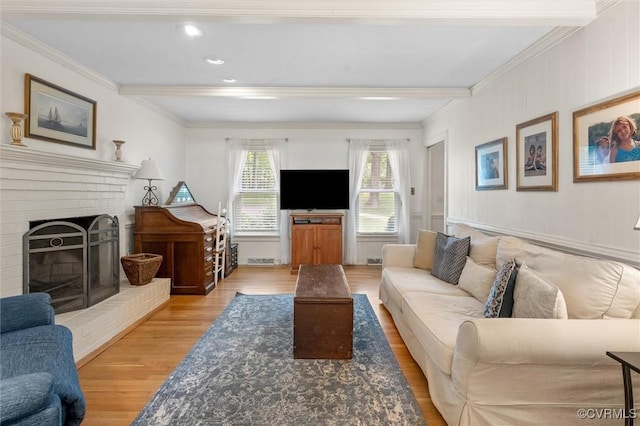 13211 Powderham Ln, Midlothian, VA 23113 - living room with light wood-style floors, ornamental molding, a fireplace, beam ceiling, and recessed lighting