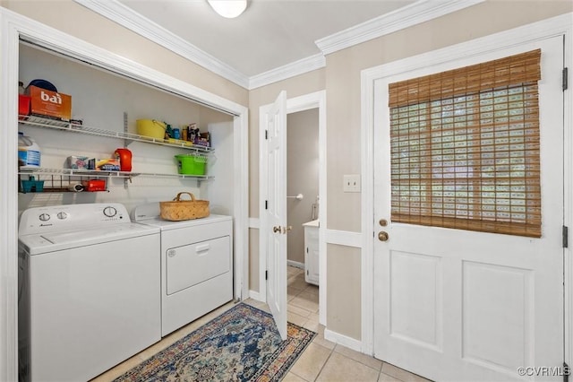 13211 Powderham Ln, Midlothian, VA 23113 - washroom featuring washing machine and clothes dryer, crown molding, light tile patterned floors, and baseboards