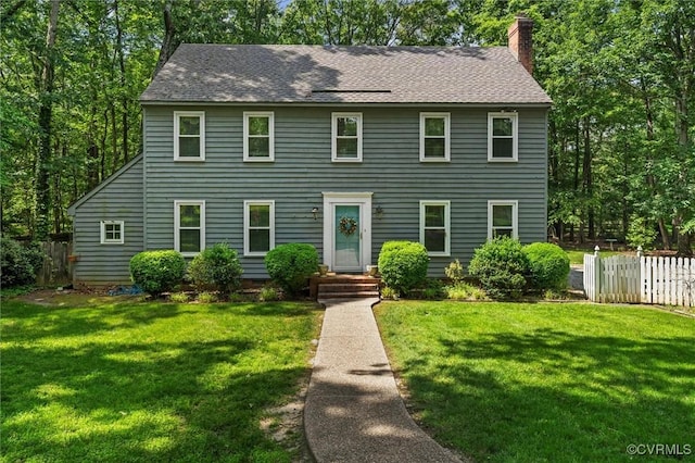 13211 Powderham Ln, Midlothian, VA 23113 - colonial home with a chimney and a shingled roof