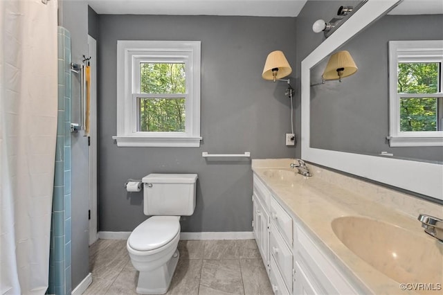 13211 Powderham Ln, Midlothian, VA 23113 - full bath featuring plenty of natural light, double vanity, toilet, and curtained shower
