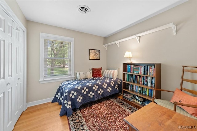 13211 Powderham Ln, Midlothian, VA 23113 - bedroom featuring wood finished floors, baseboards, and a closet