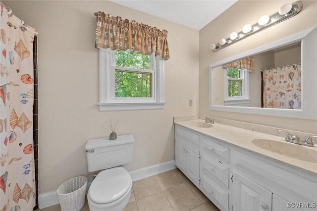 13211 Powderham Ln, Midlothian, VA 23113 - bathroom featuring plenty of natural light, double vanity, toilet, and baseboards