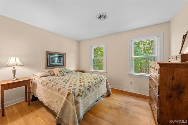13211 Powderham Ln, Midlothian, VA 23113 - bedroom with light wood-style floors and baseboards