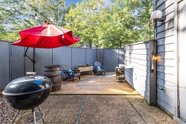 2990 Woodbridge Crossing Dr, Midlothian, VA 23112 - fenced backyard featuring a deck and a grill