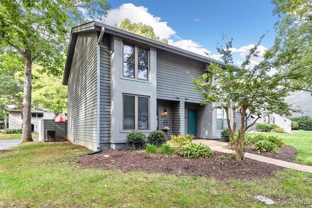 2990 Woodbridge Crossing Dr, Midlothian, VA 23112 - townhome / multi-family property featuring a front lawn