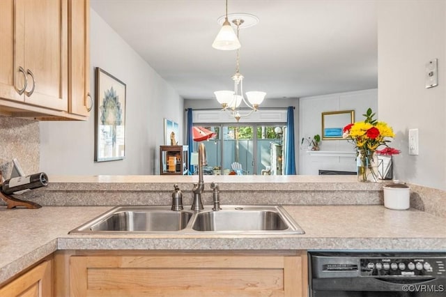 2990 Woodbridge Crossing Dr, Midlothian, VA 23112 - kitchen with dishwashing machine, light brown cabinets, a chandelier, pendant lighting, and light countertops