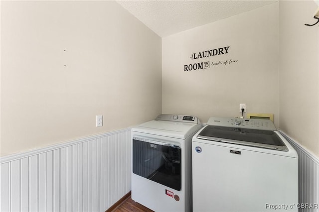 6402 Willow Landing Way, Chester, VA 23831 - laundry area featuring washer and clothes dryer, a wainscoted wall, dark wood finished floors, and a textured ceiling