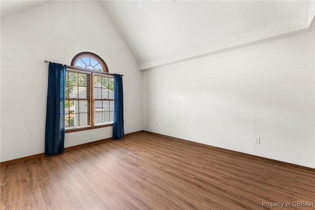 6402 Willow Landing Way, Chester, VA 23831 - unfurnished room with high vaulted ceiling, wood finished floors, and baseboards