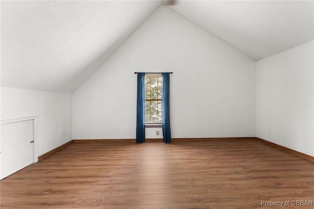 6402 Willow Landing Way, Chester, VA 23831 - additional living space featuring lofted ceiling, wood finished floors, and baseboards