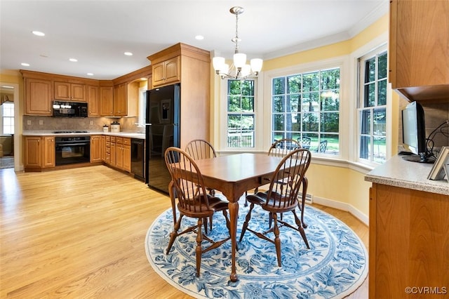1813 Locust Hill Rd, Henrico, VA 23238 - dining room featuring light wood-style flooring, a chandelier, crown molding, and recessed lighting