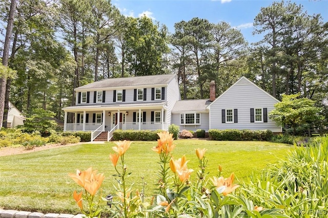 1813 Locust Hill Rd, Henrico, VA 23238 - colonial inspired home with a porch, a front yard, and a chimney
