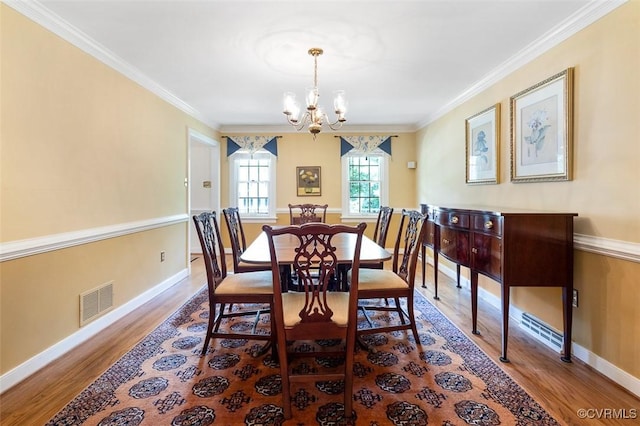 1813 Locust Hill Rd, Henrico, VA 23238 - dining room featuring wood finished floors, a chandelier, and ornamental molding
