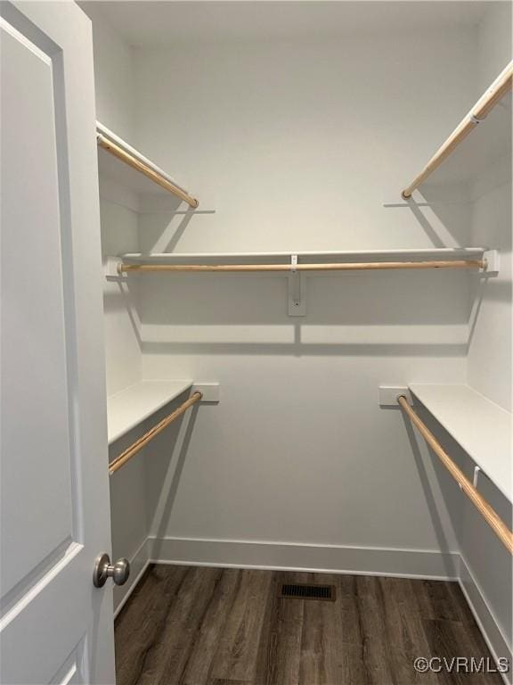 27 Otter Ln, Montross, VA 22520 - spacious closet featuring dark wood-style floors