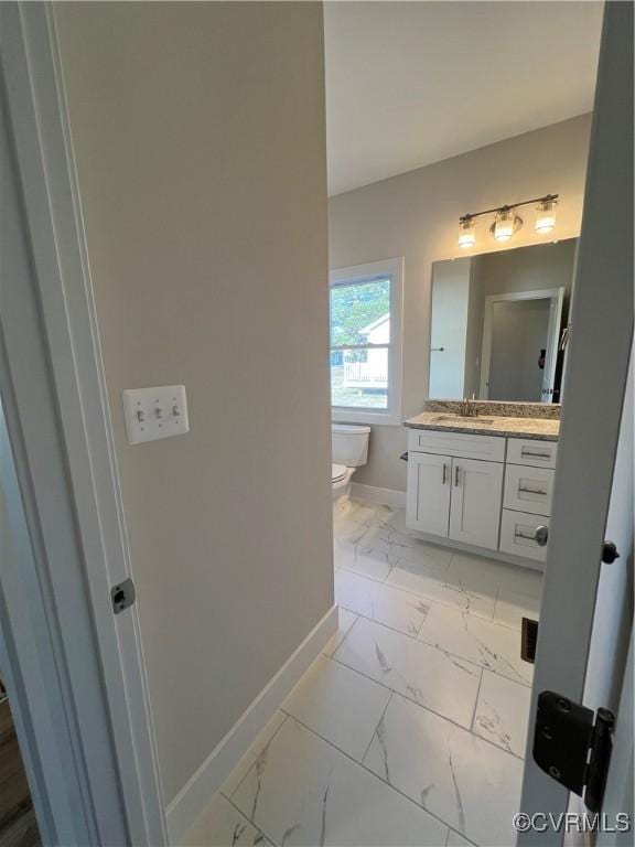 27 Otter Ln, Montross, VA 22520 - bathroom with marble finish flooring, baseboards, vanity, and toilet