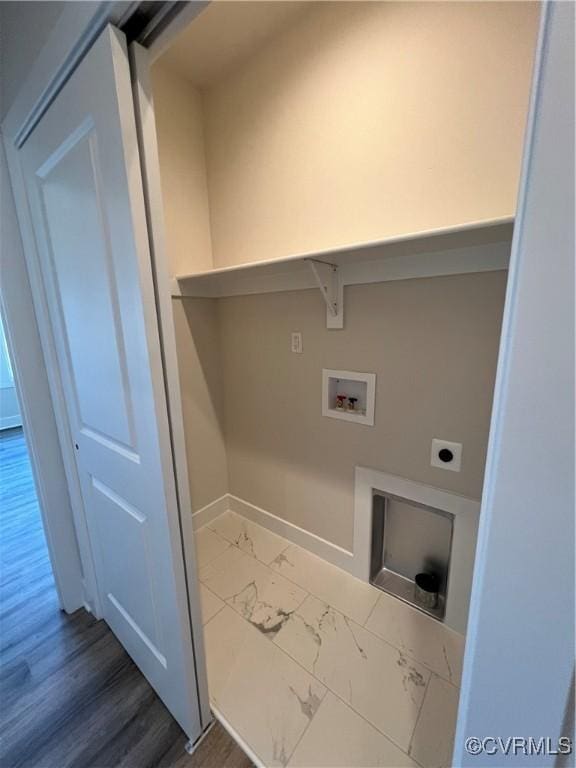 27 Otter Ln, Montross, VA 22520 - laundry area featuring hookup for an electric dryer, hookup for a washing machine, marble look tile flooring, and baseboards