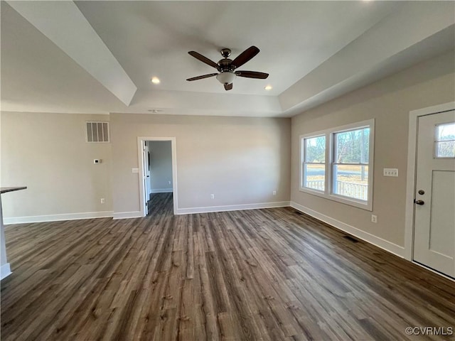 27 Otter Ln, Montross, VA 22520 - unfurnished living room featuring a ceiling fan, dark wood-style floors, baseboards, recessed lighting, and a raised ceiling