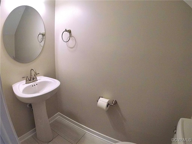 2750 Old Point Dr, Henrico, VA 23233 - half bath with toilet and tile patterned floors