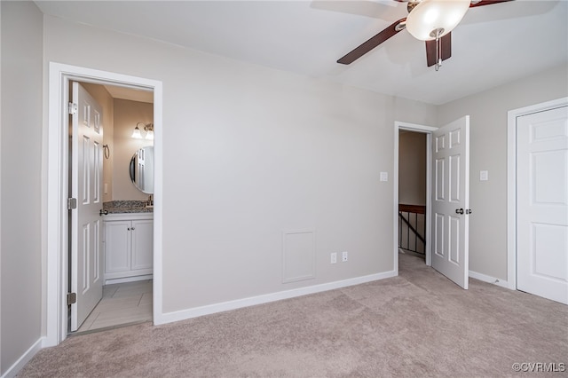 2750 Old Point Dr, Henrico, VA 23233 - unfurnished bedroom with light colored carpet, connected bathroom, and ceiling fan
